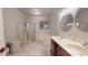 Bathroom with a shower, jacuzzi tub, double vanity, and tile flooring at 238 N Main St, Wake Forest, NC 27587