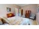 A bedroom showcases decorative dresser, plush carpeting, and refined decorative furniture at 238 N Main St, Wake Forest, NC 27587