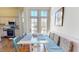 Cozy breakfast nook featuring built-in seating, a table, and kitchen access at 238 N Main St, Wake Forest, NC 27587