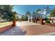 Wide driveway with a water fountain, leading up to a two-car garage and the main house at 238 N Main St, Wake Forest, NC 27587