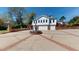 Charming home with a large circular driveway, fountain, and a convenient two-car garage at 238 N Main St, Wake Forest, NC 27587