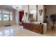 Stately foyer with chandelier, accent console table, and glass-paneled door leading to the outside at 238 N Main St, Wake Forest, NC 27587