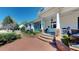Charming home with a welcoming front porch, showcasing classic architectural details and manicured landscaping at 238 N Main St, Wake Forest, NC 27587