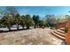 Beautiful stone paved front yard with manicured greenery and brick staircase at 238 N Main St, Wake Forest, NC 27587