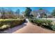 Neat walkway with manicured bushes lead to the street, complementing the neighborhood's appeal at 238 N Main St, Wake Forest, NC 27587