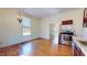 Efficient kitchenette with stainless steel appliances and plenty of natural light at 238 N Main St, Wake Forest, NC 27587