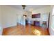 Open-concept space featuring hardwood floors, modern kitchen, and bright natural light at 238 N Main St, Wake Forest, NC 27587