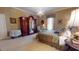 Elegant main bedroom featuring a chandelier, sitting area, and luxurious finishes at 238 N Main St, Wake Forest, NC 27587