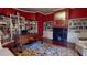 Sophisticated home office featuring built-in bookshelves, fireplace, and a classic wooden desk at 238 N Main St, Wake Forest, NC 27587