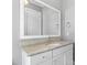 Bathroom featuring a white vanity with a granite countertop and a large mirror at 2500 Everett Ave, Raleigh, NC 27607
