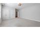 Large bedroom with plush carpeting, neutral paint, recessed lighting and double closets at 2500 Everett Ave, Raleigh, NC 27607