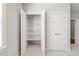 Organized walk-in closet features built-in shelving for optimal storage and organization at 2500 Everett Ave, Raleigh, NC 27607