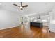 Bright open space has hardwood floors, kitchen island, and access to the outdoors at 2500 Everett Ave, Raleigh, NC 27607