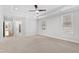 Spacious main bedroom features tray ceilings, neutral carpet, and walk-in closet at 2500 Everett Ave, Raleigh, NC 27607
