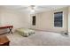 Spacious bedroom with carpet flooring and natural light from multiple windows at 2709 White Rail Dr, Fuquay Varina, NC 27526