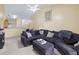 Living room with vaulted ceilings, ceiling fan and a large sectional sofa at 2800 Trailwood Pines Ln # 301, Raleigh, NC 27603