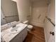Bathroom featuring neutral walls, vanity, toilet, and tub and shower combo at 2809 Haven Rd, Raleigh, NC 27610