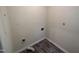 Functional laundry room with modern flooring and essential hookups, ready for appliances at 2809 Haven Rd, Raleigh, NC 27610