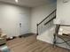 Inviting entryway with hardwood floors, staircase, and stylish console table at 307 King Closer Dr, Cary, NC 27519