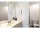 Compact bathroom featuring a single vanity and a toilet next to a shower at 316 Pebble Beach Dr, Mebane, NC 27302