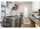 Functional laundry room with modern washer and dryer, providing convenience for household chores at 316 Pebble Beach Dr, Mebane, NC 27302