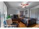 Bright bedroom with hardwood floors, a ceiling fan, and stylish furnishings, creating a relaxing atmosphere at 347 Cook Rd, Elon, NC 27244
