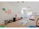 Bright bedroom with decor, featuring a bed, play area, and lots of space for activities at 3490 Old Buies Creek Rd, Angier, NC 27501