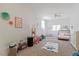 Bright bedroom with decor, featuring a bed, play area, and lots of space for activities at 3490 Old Buies Creek Rd, Angier, NC 27501