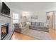 Spacious living room with a fireplace and neutral decor at 3490 Old Buies Creek Rd, Angier, NC 27501