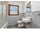Bathroom with a toilet, sink, and shower at 369 Albany St, Burlington, NC 27215