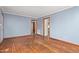 Inviting living room featuring neutral paint, hardwood floors, and doorways at 369 Albany St, Burlington, NC 27215