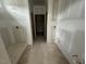 Bathroom with an unfinished shower, new plumbing, and smooth drywall, ready for customization at 381 Old Fashioned Way, Lillington, NC 27546