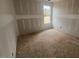 Bright bedroom offers an ideal space for rest, featuring large windows that let in natural light and views of the outdoors at 381 Old Fashioned Way, Lillington, NC 27546