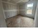 Inviting bedroom with a view, offering natural light and providing a serene space for relaxation and rest at 381 Old Fashioned Way, Lillington, NC 27546