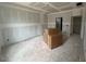 Spacious living room featuring unfinished drywall and a smooth ceiling, ready for customization at 381 Old Fashioned Way, Lillington, NC 27546