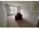 Spacious living room featuring unfinished drywall and a smooth ceiling, ready for customization at 381 Old Fashioned Way, Lillington, NC 27546