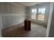 Bright living room with large windows, offering a view of the outdoors and providing an abundance of natural light at 381 Old Fashioned Way, Lillington, NC 27546