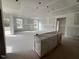 Unfinished living room with large windows and natural light, still under construction at 381 Old Fashioned Way, Lillington, NC 27546