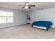 Spacious bedroom with a ceiling fan and natural light at 382 Tomahawk Dr, Clayton, NC 27520