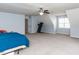 Upstairs bedroom features a treadmill and a ceiling fan at 382 Tomahawk Dr, Clayton, NC 27520