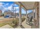 Comfortable rocking chairs on the front porch, perfect for enjoying the neighborhood view at 3925 Massey Pointe Ct, Raleigh, NC 27616