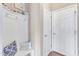 Functional mudroom with a bench, storage hooks, and a door, offering convenience and organization at 3925 Massey Pointe Ct, Raleigh, NC 27616