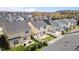 Aerial view of a backyard featuring a pergola, white fence, and green grass at 4044 Dunkirk Dr, Burlington, NC 27215