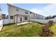 Home's backyard features a patio and green grass at 4044 Dunkirk Dr, Burlington, NC 27215