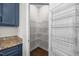 Spacious walk-in pantry with ample shelving for organized storage at 4044 Dunkirk Dr, Burlington, NC 27215