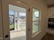 View from a kitchen window and a door to a covered back porch at 4310 Emeline Way # 18, Fuquay Varina, NC 27526