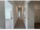 Hallway featuring carpet, leading to various rooms in the home at 4310 Emeline Way # 18, Fuquay Varina, NC 27526