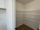 View of a walk-in pantry with multiple levels of metal shelving at 4310 Emeline Way # 18, Fuquay Varina, NC 27526
