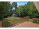 Large outdoor deck area overlooks the spacious backyard and storage shed at 4408 Poplar Dr, Raleigh, NC 27610
