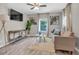 Cozy living room features neutral tones, stylish decor, and modern furnishings at 4408 Poplar Dr, Raleigh, NC 27610